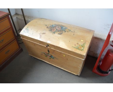 A large stripped pine dome top trunk with floral decoration, interior fitted with candle box and tray
