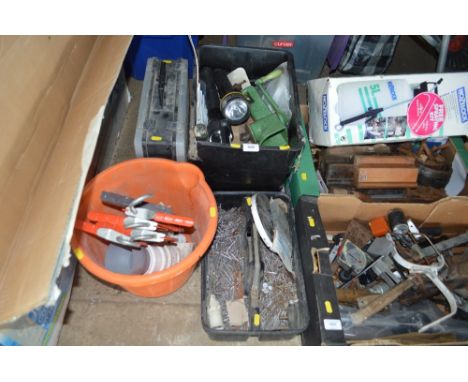 A plastic box; a bucket and a tray of various tools and fittings