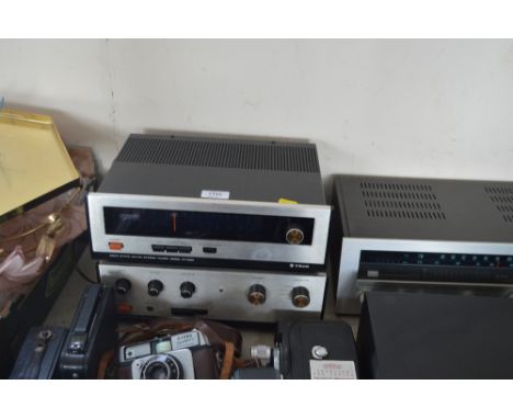A trio stereo turner together with a stereo amplifier