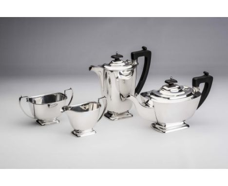 AN ART DECO FOUR PIECE SILVER TEA AND COFFEE SERVICE, maker's mark AS, Birmingham 1936, of rounded flared oblong form with eb