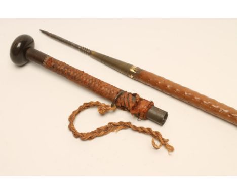 A SPEAR/SWORD STICK, the top section with horn knob and leather grip screwing off to reveal a 3 1/2" steel spike mounted to t