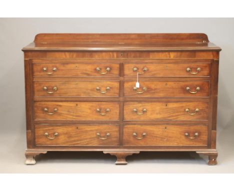 A GEORGIAN LANCASHIRE MAHOGANY DRESSER, c.1800, crossbanded with stringing and chequer banding, the moulded edged and hinged 