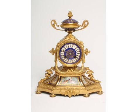 A FRENCH ORMOLU AND PORCELAIN CASED MANTEL CLOCK, late 19th century, the twin barrel movement striking on a bell, the back pl