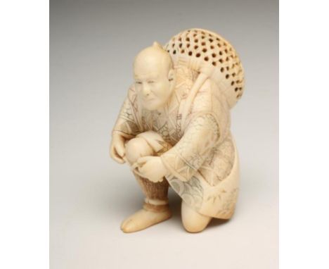 A JAPANESE ONE PIECE IVORY FIGURE, Meiji period, carved as a man carrying a pierced basket on his shoulders, kneeling and tyi