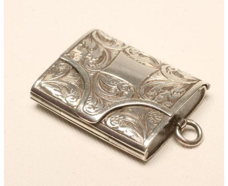 A VICTORIAN SILVER PENDANT VINAIGRETTE, maker's mark JT, Birmingham 1863, in the form of a stamp case with bright cut foliate