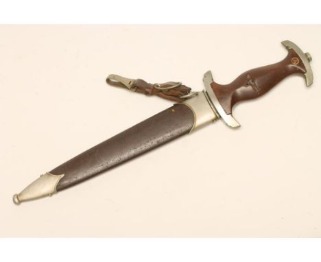 A THIRD REICH SA DAGGER, the 8 3/4" blade with Carl Eickhorn maker's mark inscribed "alles fur Deutschland", shaped wood grip