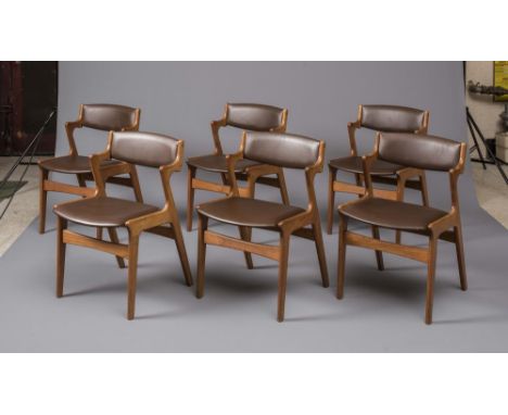 A SET OF SIX DANISH TEAK CHAIRS by Dyrlund, upholstered in brown leatherette, the open back with zigzag shaped uprights enclo