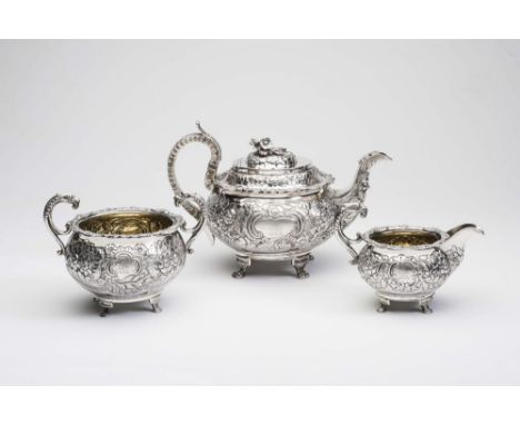 A GEORGE IV IRISH SILVER THREE PIECE TEA SERVICE, maker Jas. Scott & West, Dublin 1822 and 1823 (teapot), of squat globular f