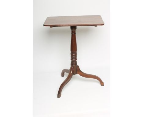 A MAHOGANY TRIPOD TABLE, early 19th century, the reeded edged rounded oblong snap top on baluster and ring turned stem, down 