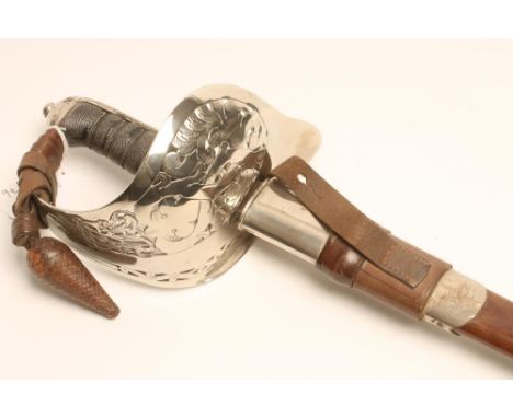AN 1895 PATTERN INFANTRY OFFICER'S SWORD, the 32 1/2" blade etched with foliate scrolls, crown over VR, the royal coat of arm