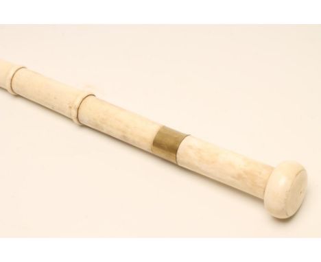 A SECTIONAL BONE SWORD STICK, early 20th century, with 14" square section blade, bone knob handle and bone scabbard, 35 3/4" 