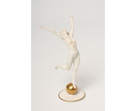 A HUTSCHENREUTHER PORCELAIN FIGURE - "Sun Child", c.1947, after K. Tutter, the young female nude balancing on her left foot o