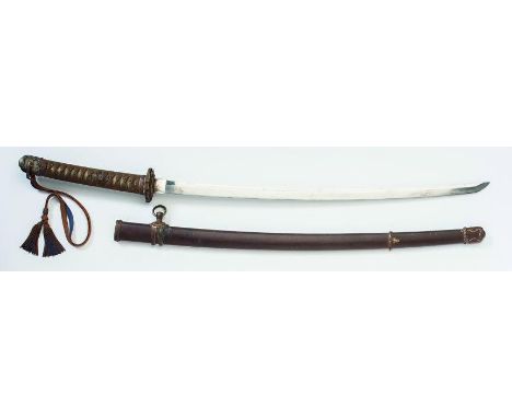 A JAPANESE KATANA, with 26 1/2" possibly Shinto blade, visible hada, undulating hamon, Showa mounts, shagreen grip, officer's