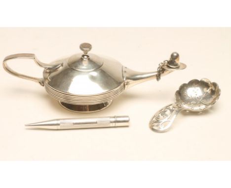 A SILVER CADDY SPOON, maker D.N. Halsey & Sons, Sheffield 1944, with scrolling foliate pierced handle and lobed bowl, 3" long