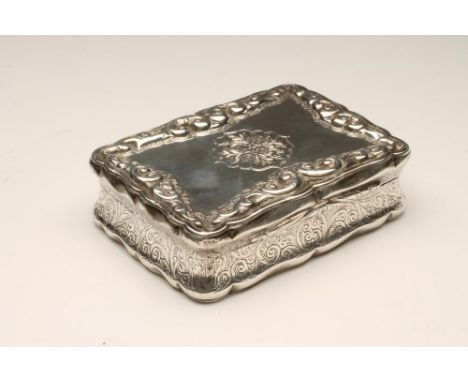 A MID VICTORIAN SILVER TABLE SNUFF BOX, maker's mark W.D., Birmingham 1863, of waisted rounded oblong form, the sides and bas