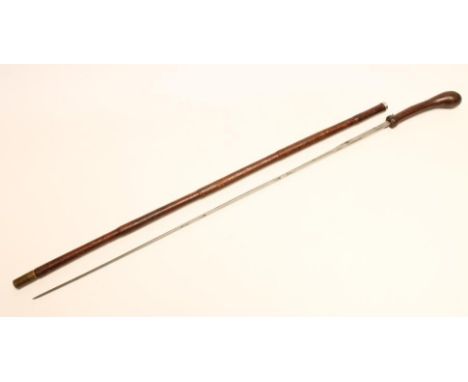 A LEATHER BOUND SWORD STICK, late 19th/early 20th century, with 26 1/4" foliate etched blade, metal fuller and knob grip, 33 