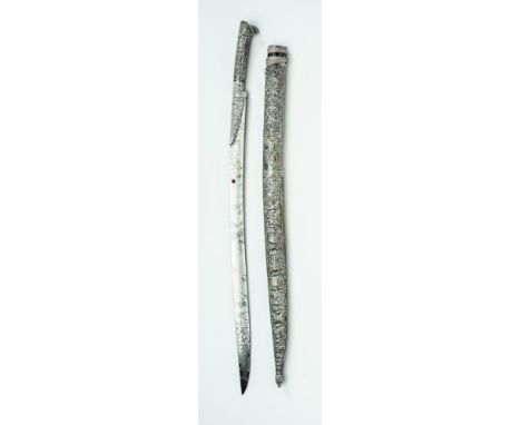 A TURKISH YATAGHAN SWORD, 19th century, the 24 1/4" single edged blade with stamped and pierced silver mounts, hilt and scabb