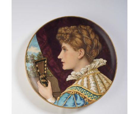 A MINTON ARTS AND CRAFTS EARTHENWARE PLAQUE, 1876, of plain shallow dished circular form painted in polychrome enamels by C.L