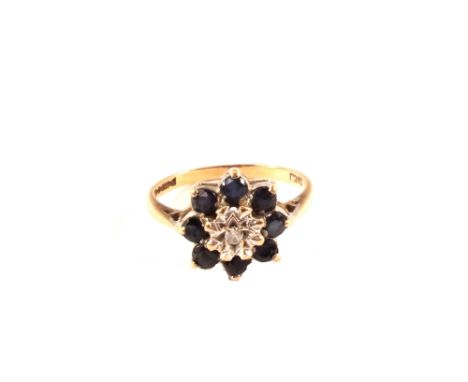 A 9ct gold sapphire and diamond cluster ring, size K