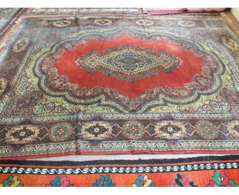 A machine made Persian pattern floral carpet, 138" x 107"