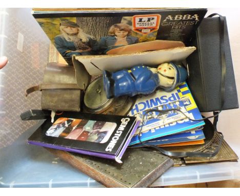 A box of mixed items including LP's, stamps, barometer, Regent 10x50 binoculars, 1970 Ipswich Town programmes etc