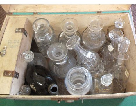 A metal bound trunk containing 19th Century decanters plus a box of china