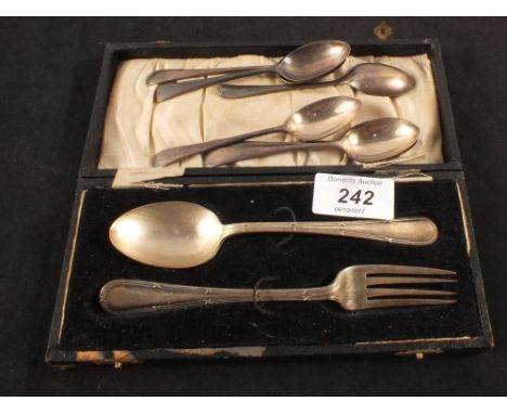 A set of six silver coffee spoons plus a cased spoon and fork