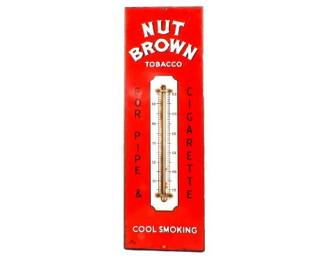 A red ground enamel Nut Brown Tobacco thermometer, 22" x 7"