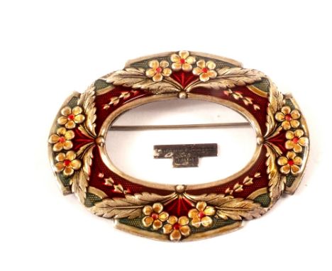 A French enamelled brooch by Catherine Popesco, floral decoration with red, green and yellow enamel work