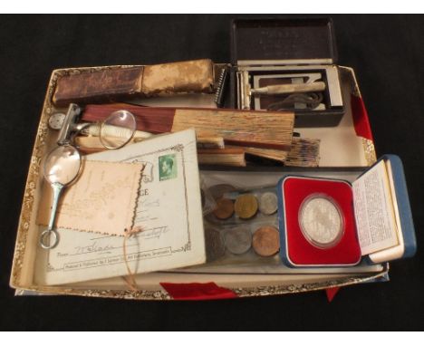 A silver and guilloche enamel lorgnette and coins