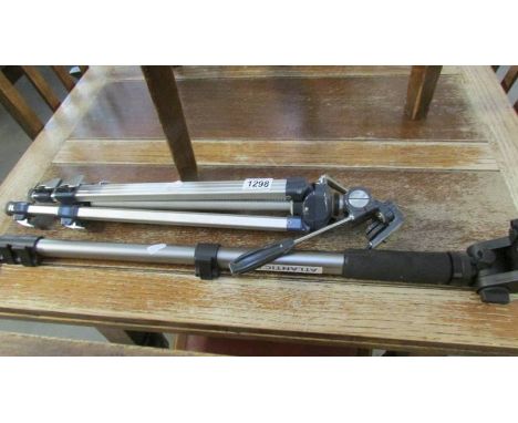 A camera tripod and one other item.