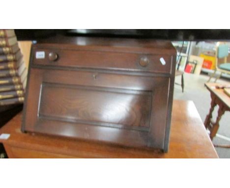 An unusual oak travelling bureau by Ercol.