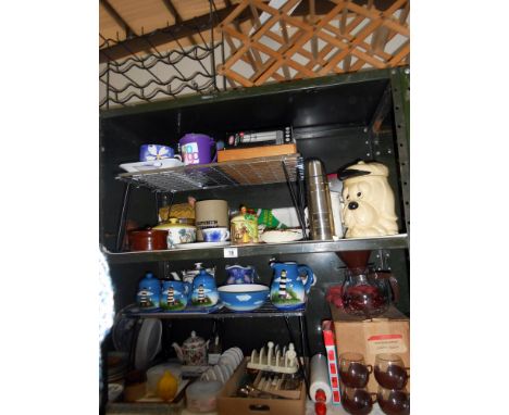 3 shelves of kitchenalia including nut brown rolling pin, Sylvac tea caddy, vintage perculator and cups, cookie cutters, toas