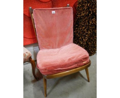 An Ercol lounge chair.