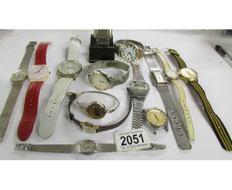 A Vintage Swatch 4275-P tennis grid watch and other watches.