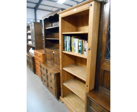 A solid pine 5 shelf book case, Height 183.5cm, width 77cm approx.