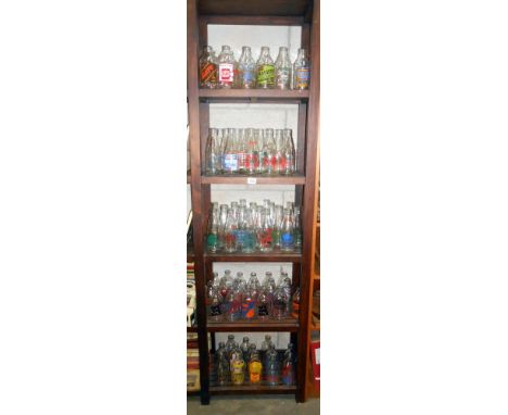 A good lot of vintage advertising milk bottles approx 79 in total. Collect only