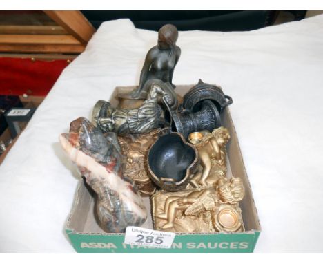 A pair of gilded resin cherub candlesticks, trinket box, marble lion, white metal items, and the little mermaid statue on roc
