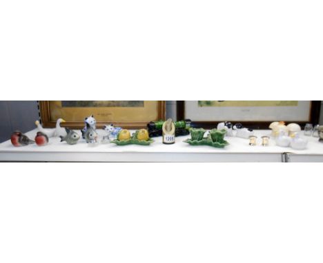 A mixed lot of novelty cruets including Goebel fish, steam trains, part Carlton war mushroom set, egg cups etc., some missing
