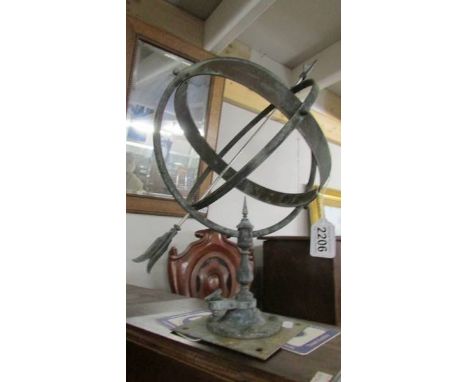 A brass sundial. ****Condition report**** Postage to Mainland UK £20+VAT=£24Postage to Ireland £35+VAT=£42Height to top of ar