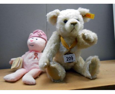 A Steiff Danbury Mint Millenium 2000 bear and a hope breast cancer charity bear