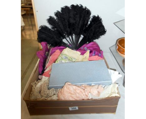 A box of assorted textiles including lace, dresses, accessories a/f
