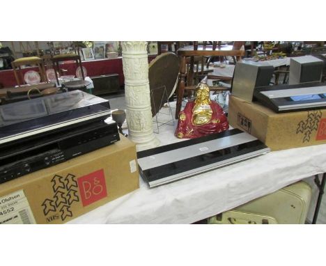 A Bang & Olufsen (B & O) amplifier, cassette deck, record deck, speakers and VHS player. ****Condition report**** Video playe