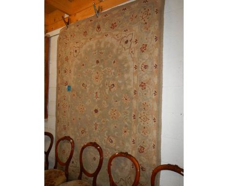 A large old carpet, needs cleaning, 230 x 160 cm.