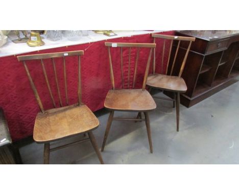 3 Ercol style stick back kitchen chairs.