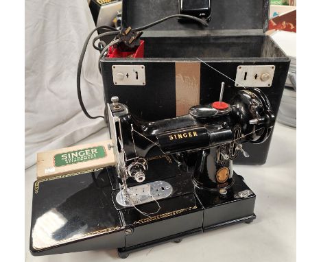 A Singer 222K electric sewing machine in original box (sold as a collectors item only) 