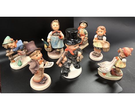 A group of 7 Hummel children 