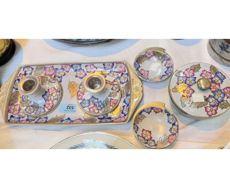 An Art Deco period 5 piece trinket set by Charlotte Rhead, with tray 