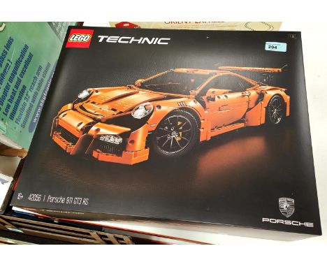 An originally boxed Lego Technic 1:8 scale Porsche 911 GT3 RS kit numbered 42056 WE TAKE GREAT CARE in the accuracy of our co