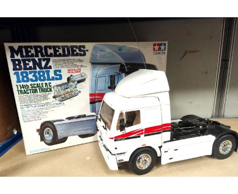 A Tamiya Mercedes-Benz 1838LS 1/14th scale RC Tractor Truck, built with original box including paperwork etc (from an estate 